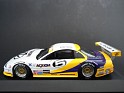 1:43 Minichamps Oldsmobile Aurora 1996 White W/Purple & Yellow Stripes. Subida por indexqwest